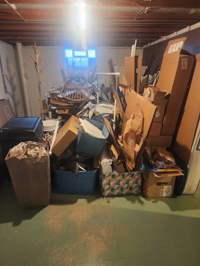 Roll-off dumpster container at job site for 20 Yard Dumpster Rental in West Liberty